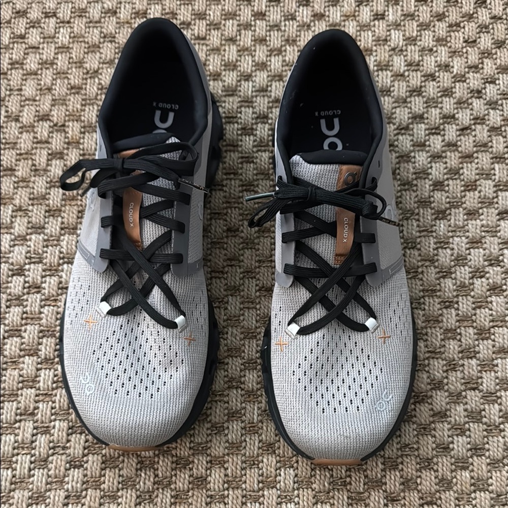 On Running Gray and Black Athletic Shoes with Modern Mesh Design